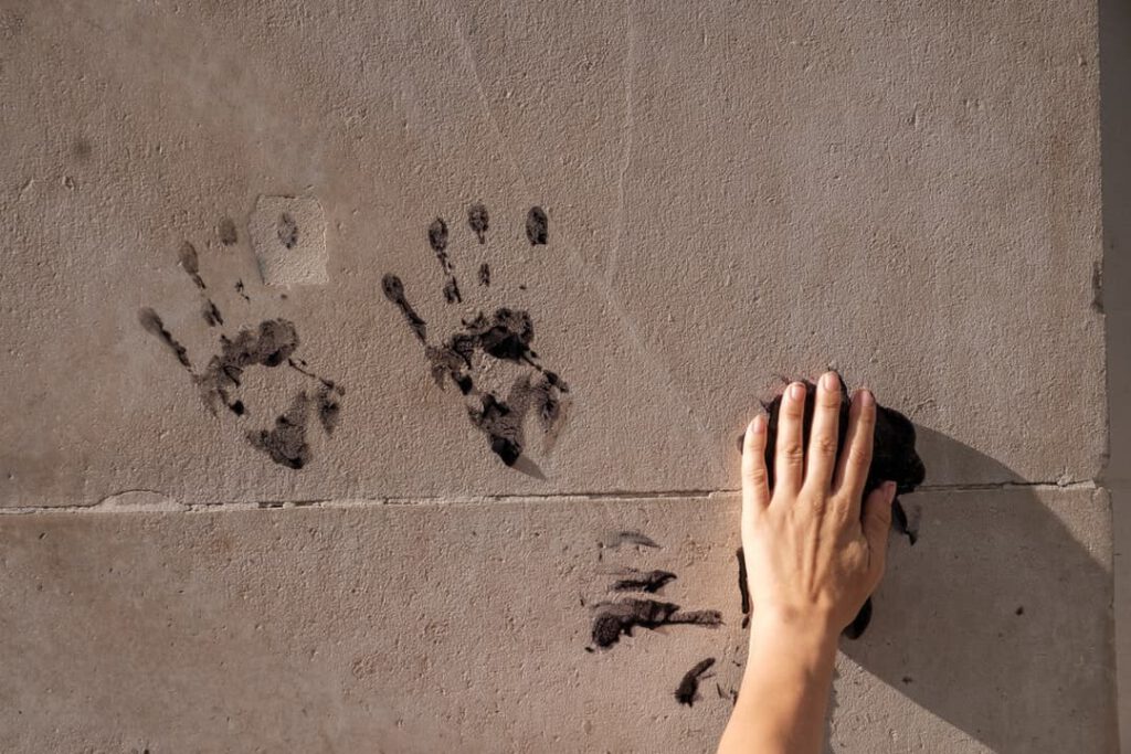 handprints on wall